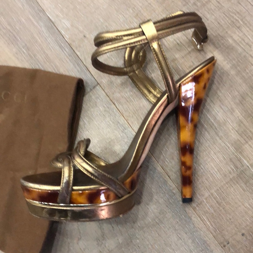 Gucci heels with tortoise colored heel